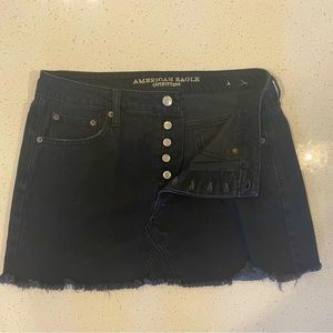 Womens black denim, frayed, button up skirt. American Eagle size 10.